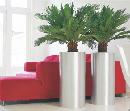 Tall round steel planter